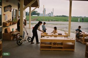 Small rural child care centre beside a general store with a child's tricycle out front