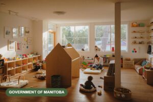 A bright newly opened infant and preschool child care room with low wooden shelves and soft play mats in morning light